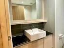 Modern bathroom with a stylish sink and vanity