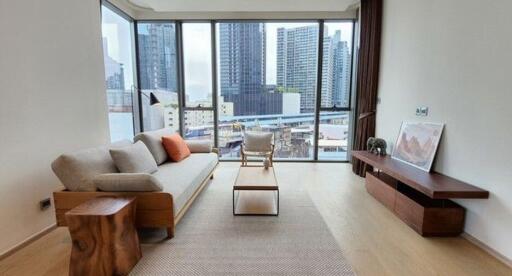 Modern living room with city view through large window