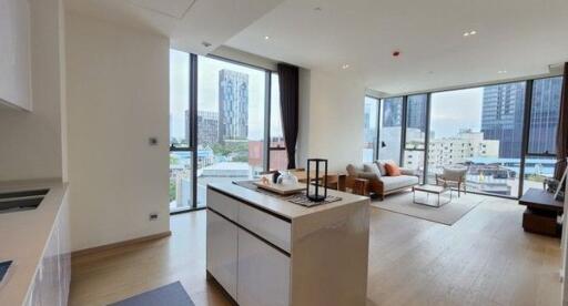 Modern open-plan living room with city view