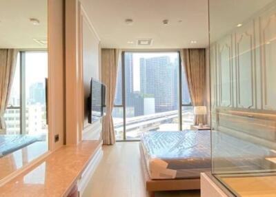 Luxurious bedroom with modern decor and city view