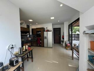 Spacious kitchen with modern appliances and ample storage