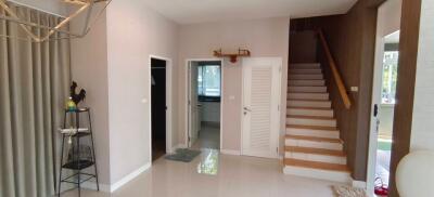 Spacious living area with staircase and modern interior