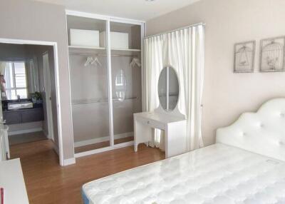 Elegant bedroom with stylish decor and access to bathroom