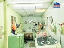 Well-equipped compact laundry room with multiple appliances and storage solutions