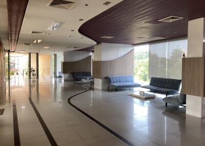 Spacious and modern lobby interior with elegant furnishings