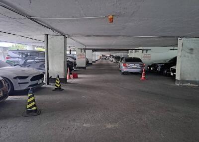 Spacious indoor parking garage with multiple vehicles
