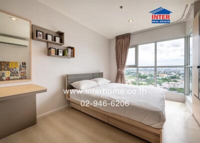 Bright and spacious bedroom with city view