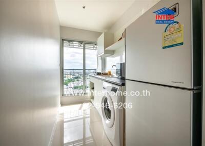 Modern kitchen with city view and ample natural light