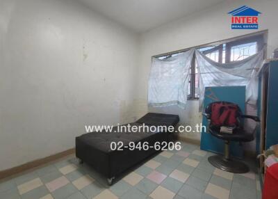 Spacious unfurnished living room with mild signs of wear