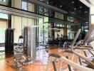 Modern gym interior with various exercise equipment
