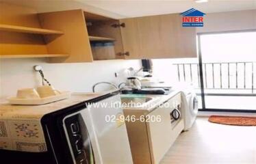 Modern kitchen with natural light and ample storage space