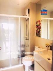 Modern bathroom with shower enclosure and vanity