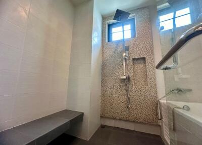 Modern bathroom with skylight and shower area