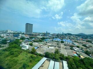 Panoramic city and landscape view from high-rise building window