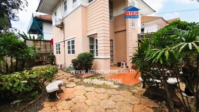 Spacious two-storey house with landscaped front yard