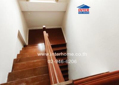 Interior view of a wooden staircase in a house