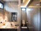 Elegant modern bathroom with wood and marble finishes