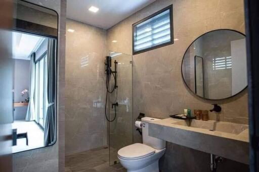 Modern bathroom interior with shower and mirror