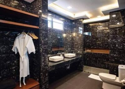 Luxurious black marble bathroom with modern fixtures