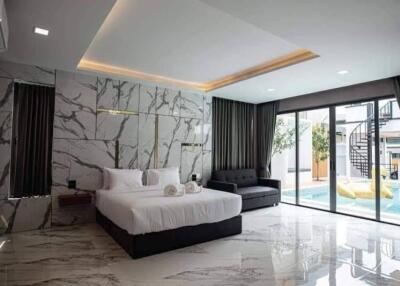 Luxurious modern bedroom with marble flooring and elegant decor