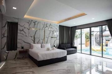 Luxurious modern bedroom with marble flooring and elegant decor