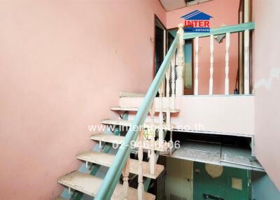 Interior view of a painted staircase in a residential building