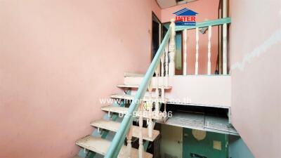 Interior view of a painted staircase in a residential building