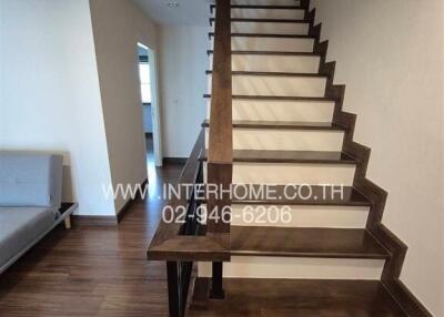 Modern wooden staircase in a home interior