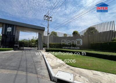 Gated community entrance with security and modern design