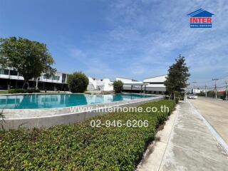 Inviting outdoor swimming pool in modern residential complex