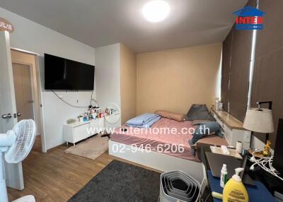 Compact and well-furnished bedroom with modern amenities