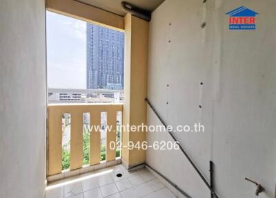 Compact balcony with urban view in high-rise building
