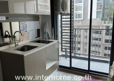 Modern kitchen with island and ample natural light