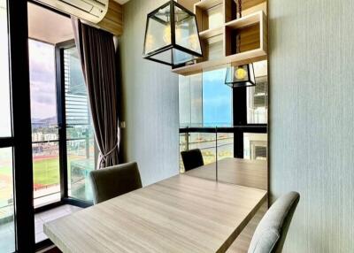 Modern dining area with panoramic window view