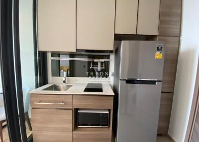 Modern compact kitchen with updated appliances