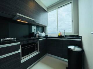 Modern kitchen with ocean view and high-end appliances