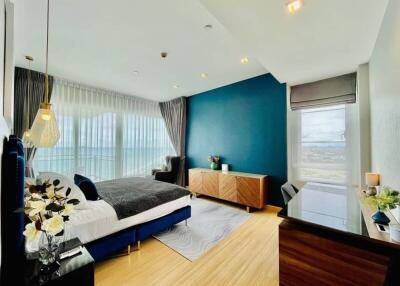 Modern bedroom with ocean view and stylish interior