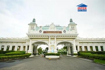 Elegant historical building with ornate facade and landscaping