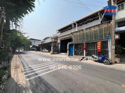 Exterior view of commercial buildings on a quiet street