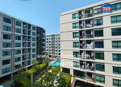 Exterior view of a modern apartment complex with balconies