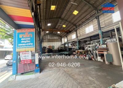 Spacious industrial workshop interior with machinery and tools