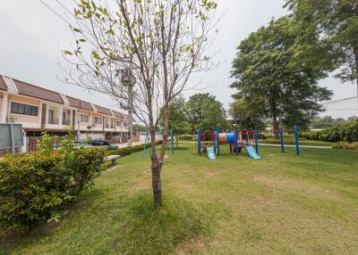 Community playground and park area in residential neighborhood
