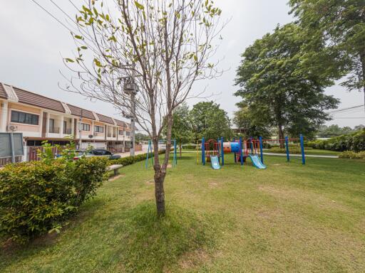 Community playground and park area in residential neighborhood