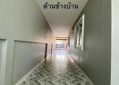 Bright and sleek hallway with marble flooring