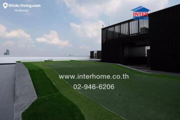 Modern exterior of a building with synthetic grass and contemporary design