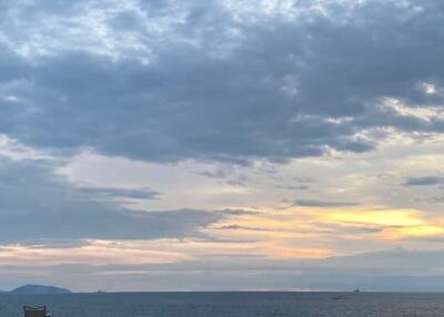 Luxurious infinity pool overlooking the sea at dusk