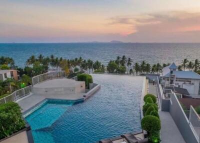Luxurious seaside pool with sunset view