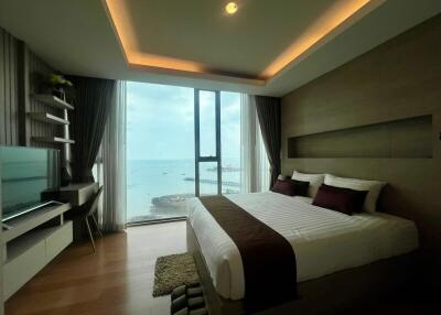 Modern bedroom with seaside view and elegant interior design