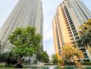 High-rise residential buildings with a swimming pool in the foreground