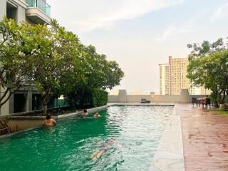 Outdoor swimming pool in a residential complex